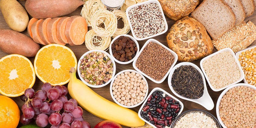 large serving of various carbohydrate foods 