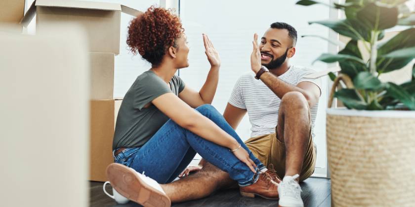 young couple celebrating new home