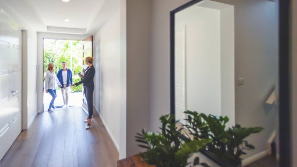 Young couple purchases their first home