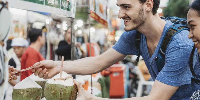 traveller paying with cash