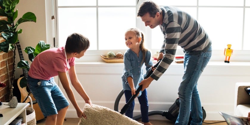 kids cleaning house with dad