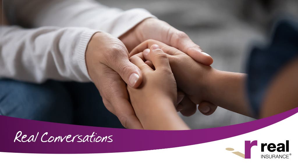 Mother and child hold hands (close up)