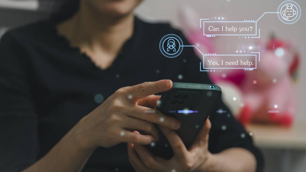 Woman on smartphone uses ChatGPT artificial intelligence tool 