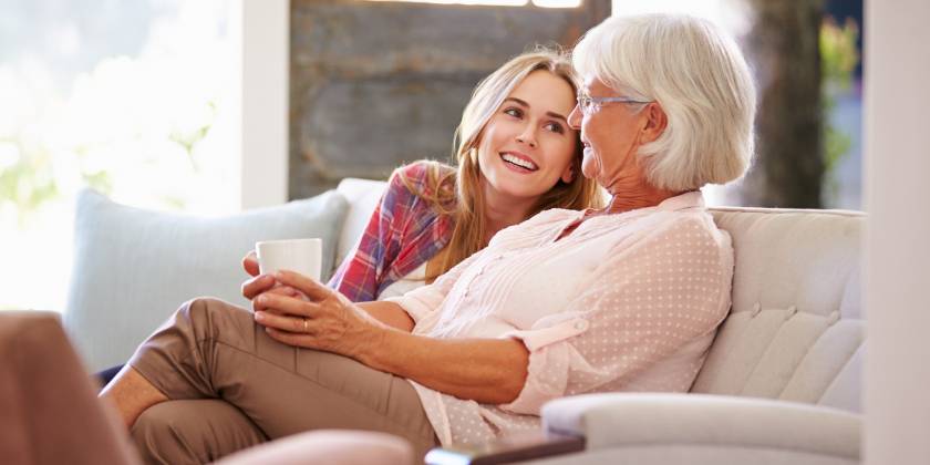 older woman and daughter talking about funeral
