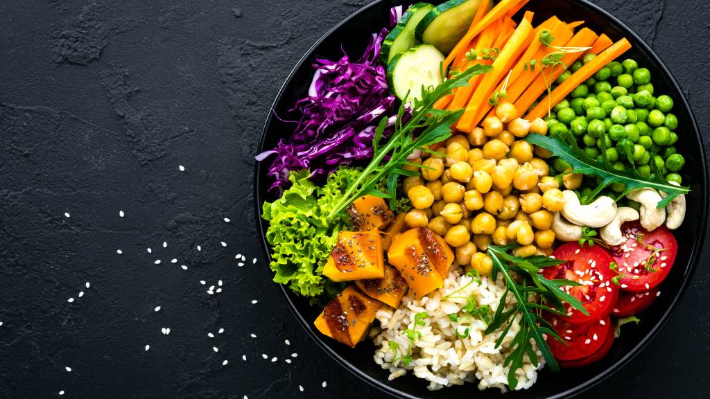 Plate of superfoods including chic peas, rice, capsicum and seeds