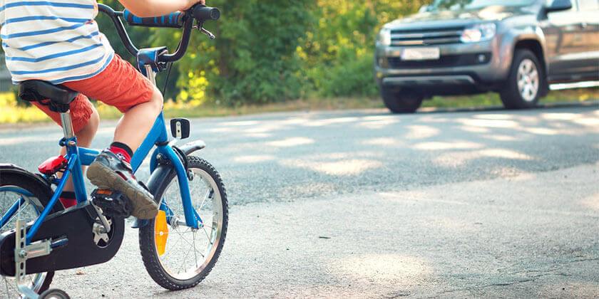 child riding bike