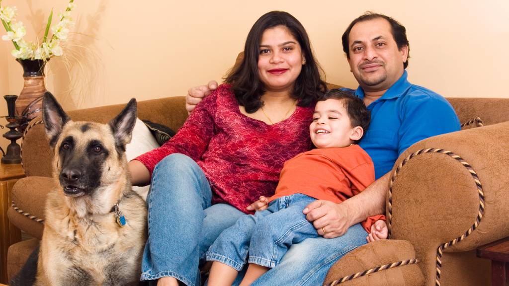 family with german shepherd dog