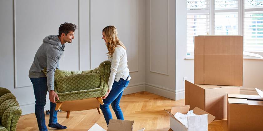 young couple moving into dream home
