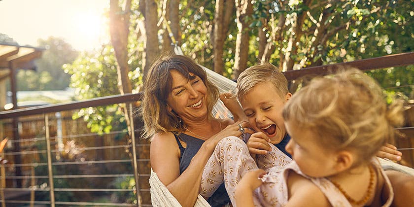 mother enjoying family time with children
