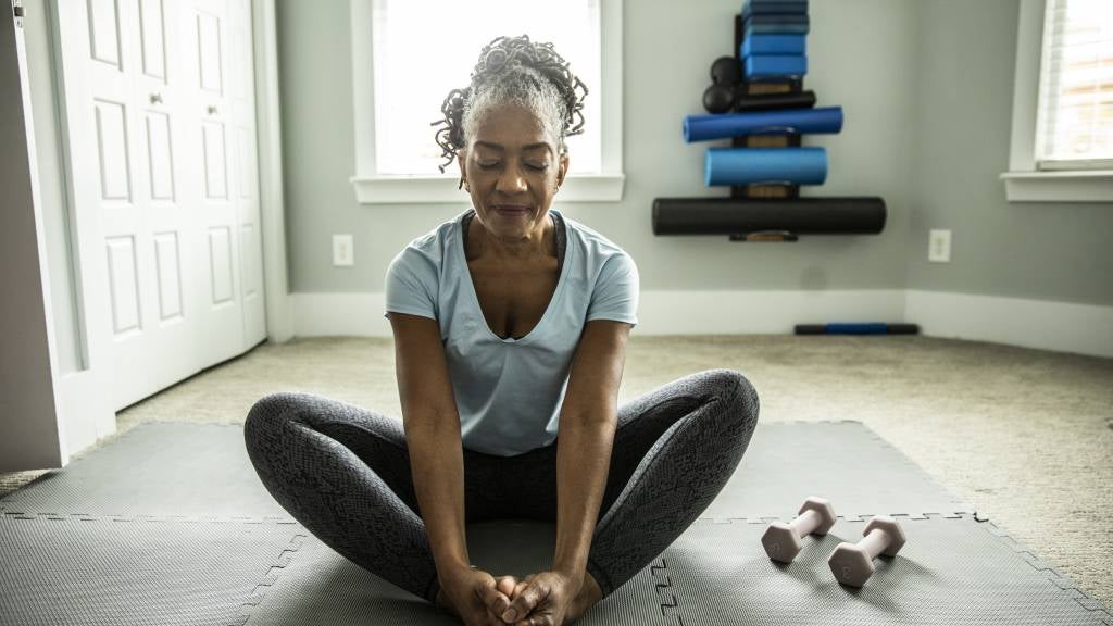 Woman in her 60s doing yoga