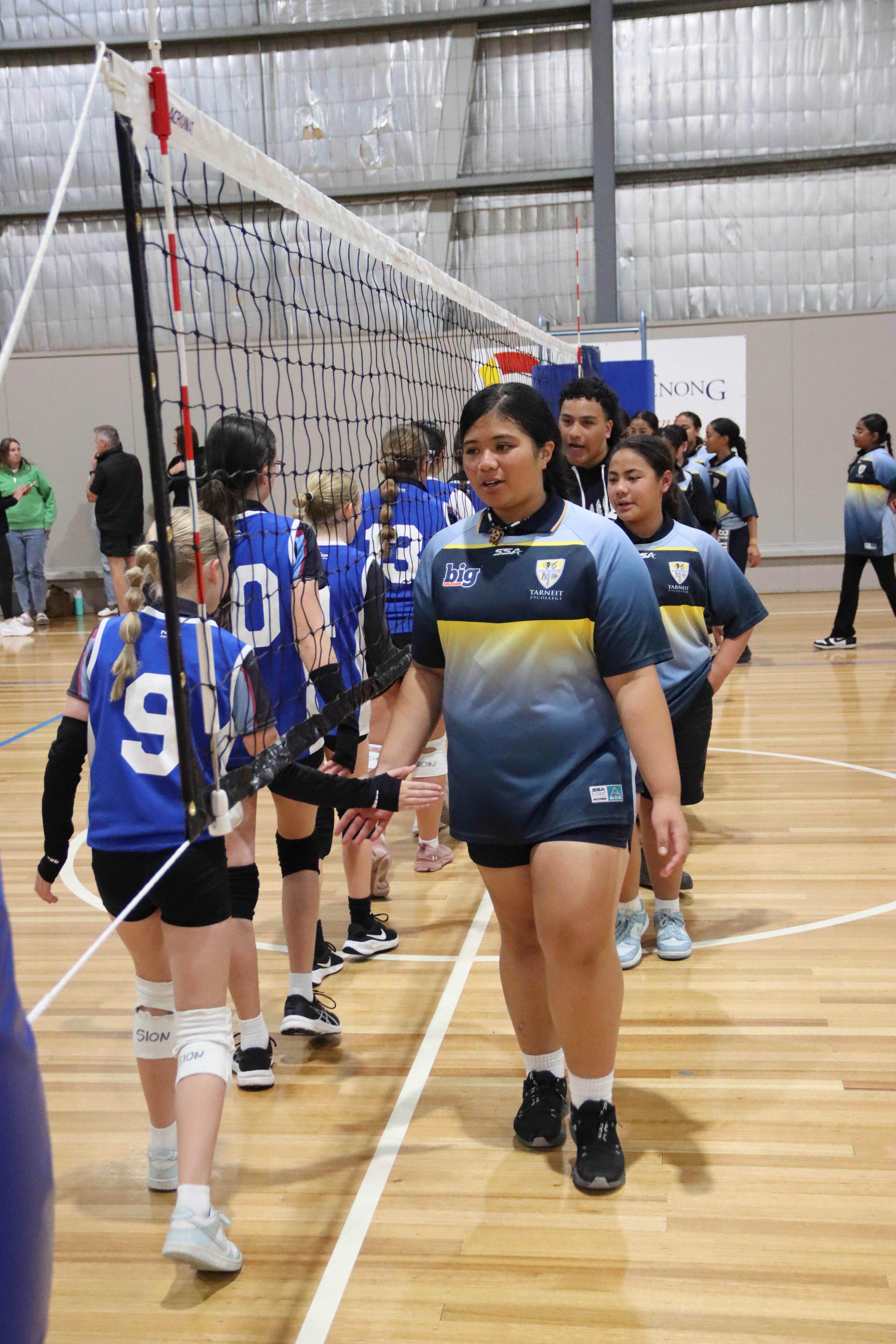 Volleyball-StateChampions-NetCelebrations.JPG