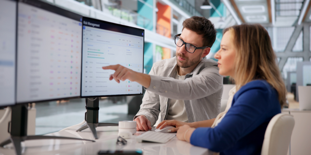 Cybersecurity specialist reviewing data breach alerts