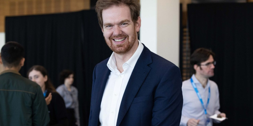 Smiling red head man