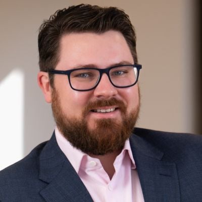 Headshot of Michael Storozhev.