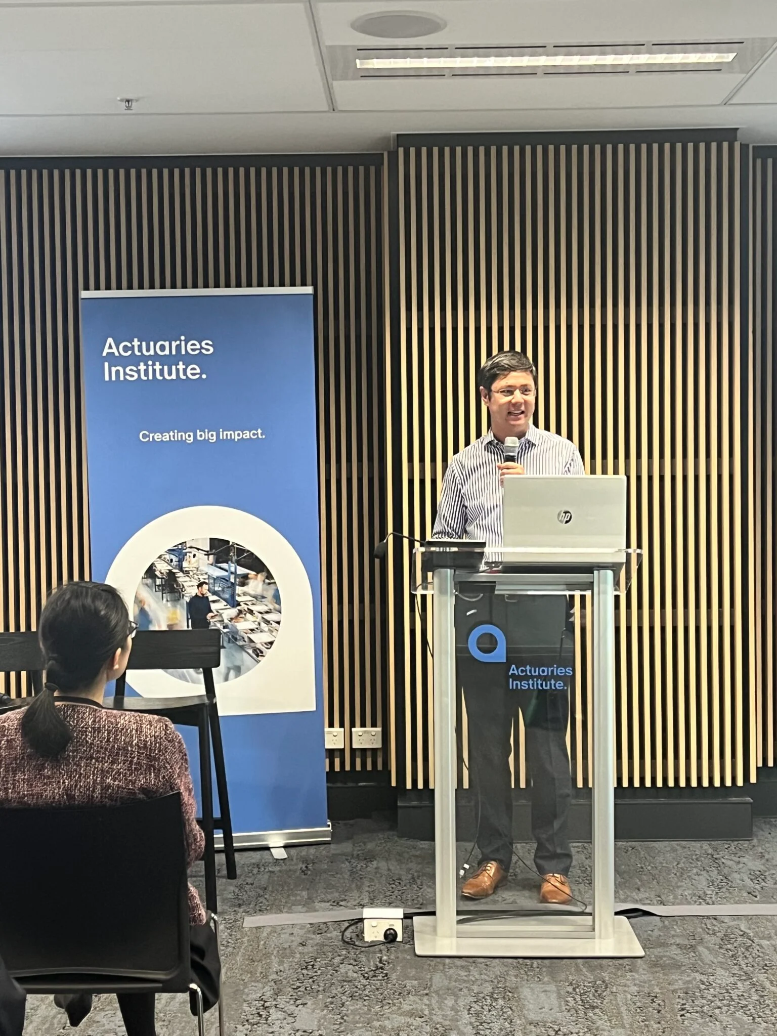 Peter Baker presenting to the audience