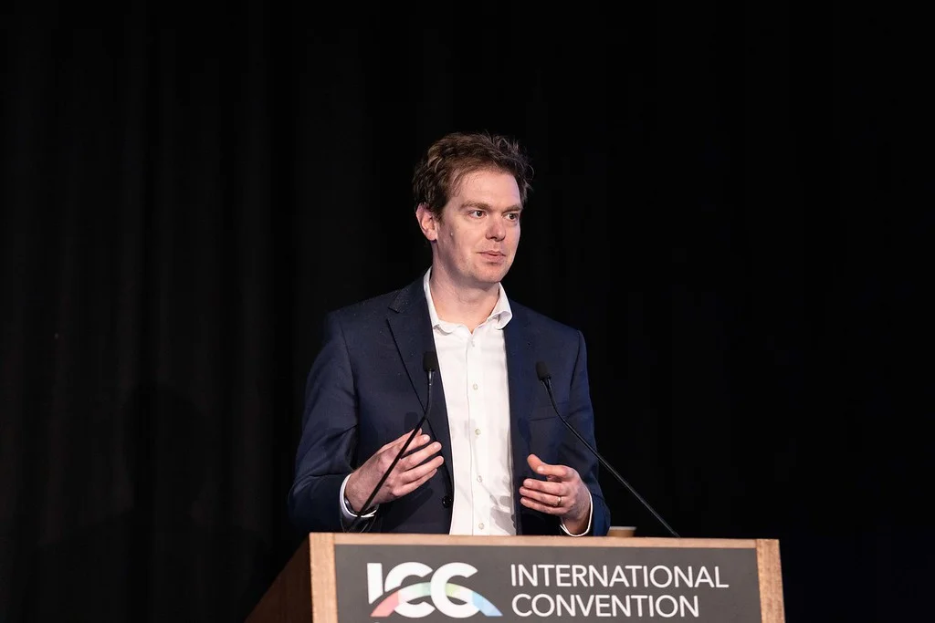 Hugh Miller speaking at ICA2023 in Sydney