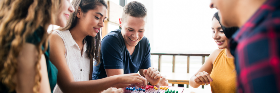 People having fun playing board games. 