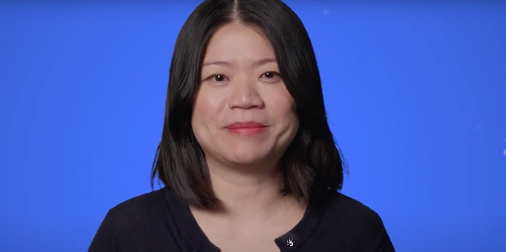 Actuary against blue background with black hair