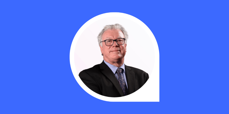 A headshot of John Maroney inside the Actuaries Institute viewfinder.