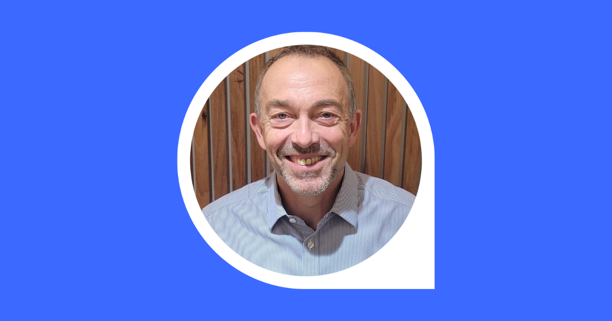 A headshot of John Evans, Chief Examiner for Banking.