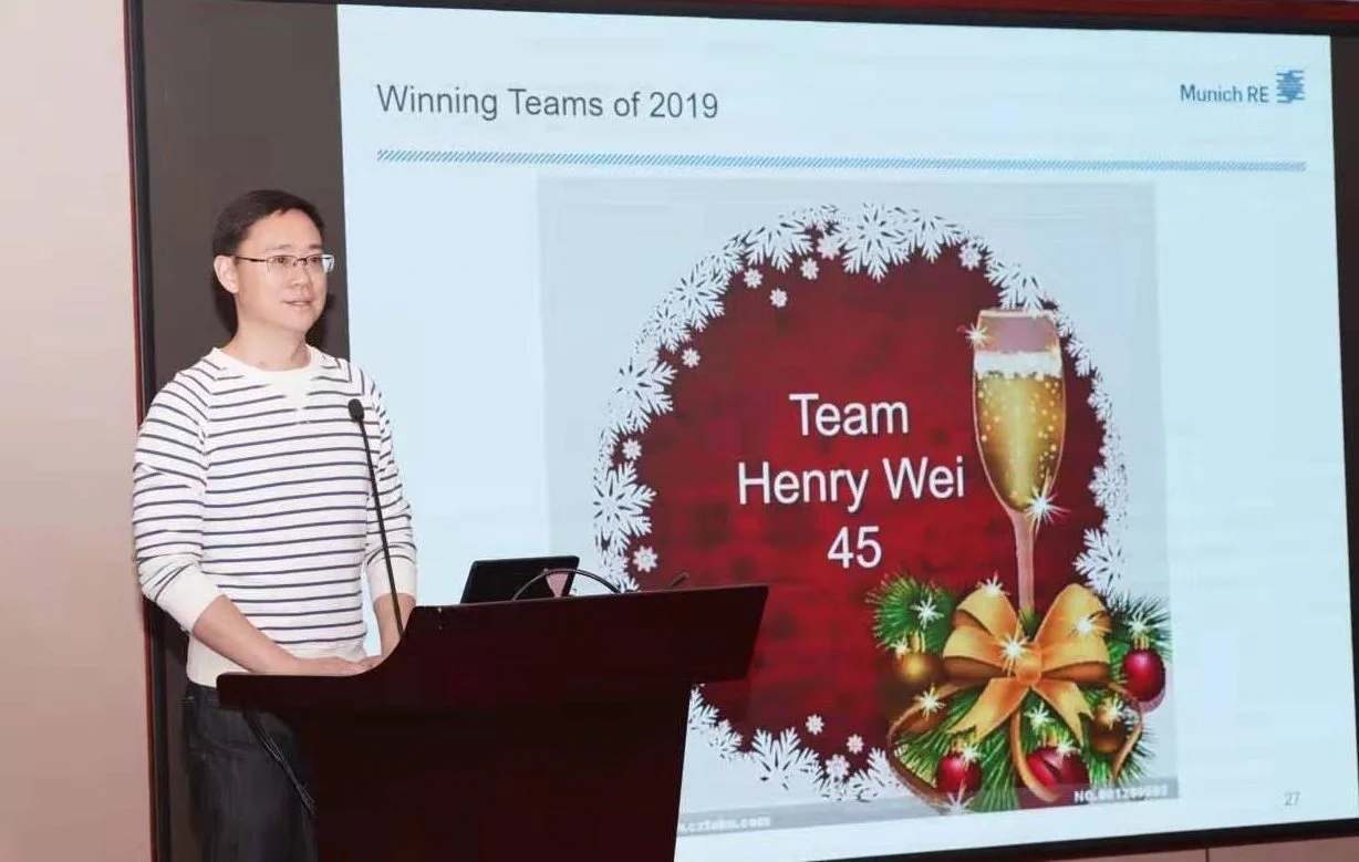 Henry Wei addresses the audience at the 2019 Munich Re Cup.