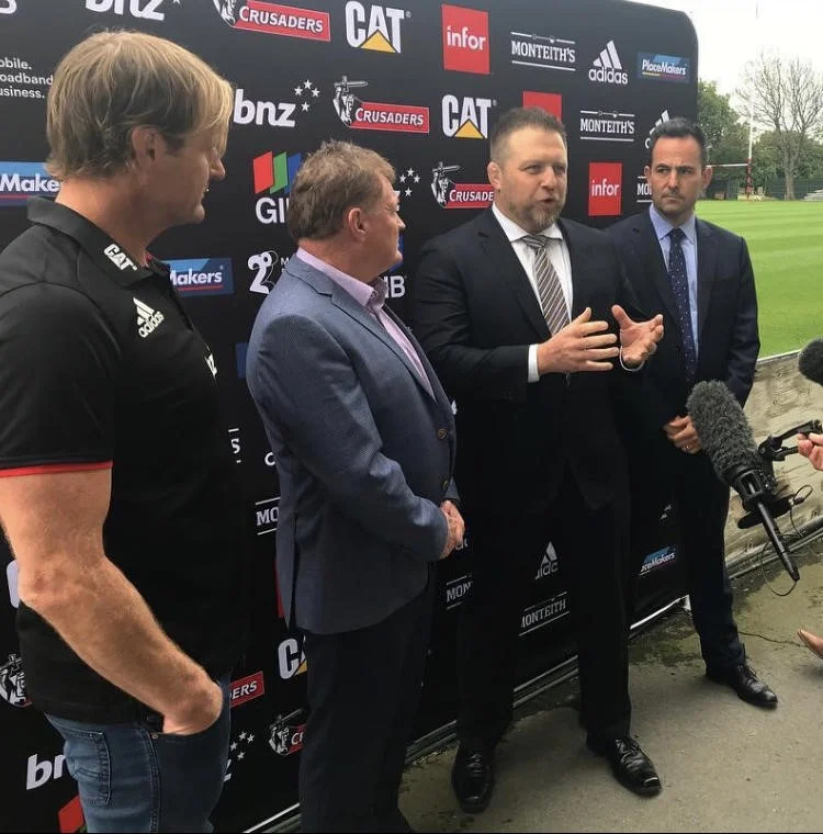 Douglas presenting Australasia's Best Sporting Team 2018 to the Crusaders in New Zealand with All Blacks coach Scott Robertson (left) and Ben Darwin (speaking) from GAIN LINE.
