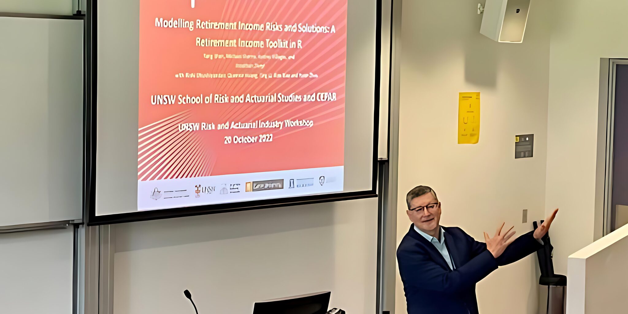 A photo of Michael Sherris teaching a class.