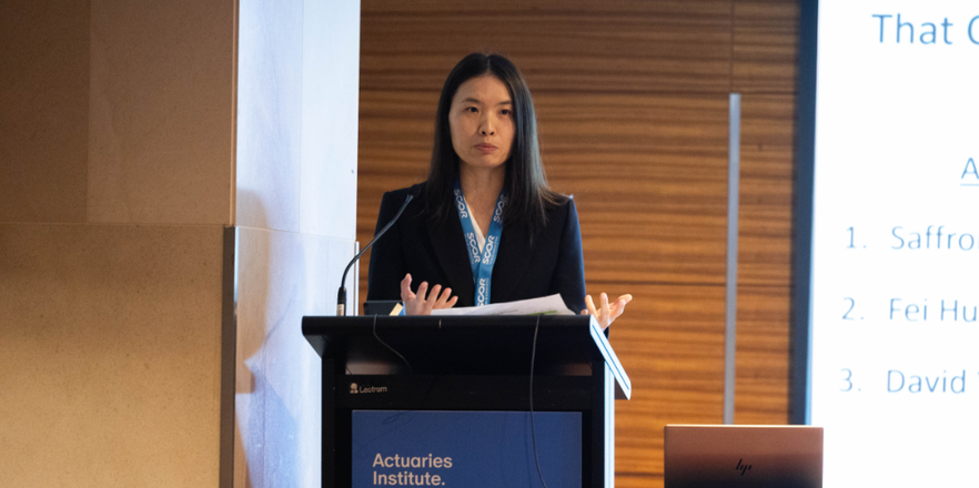 Dr Fei Huang presenting at the 2025 All Actuaries Summit.
