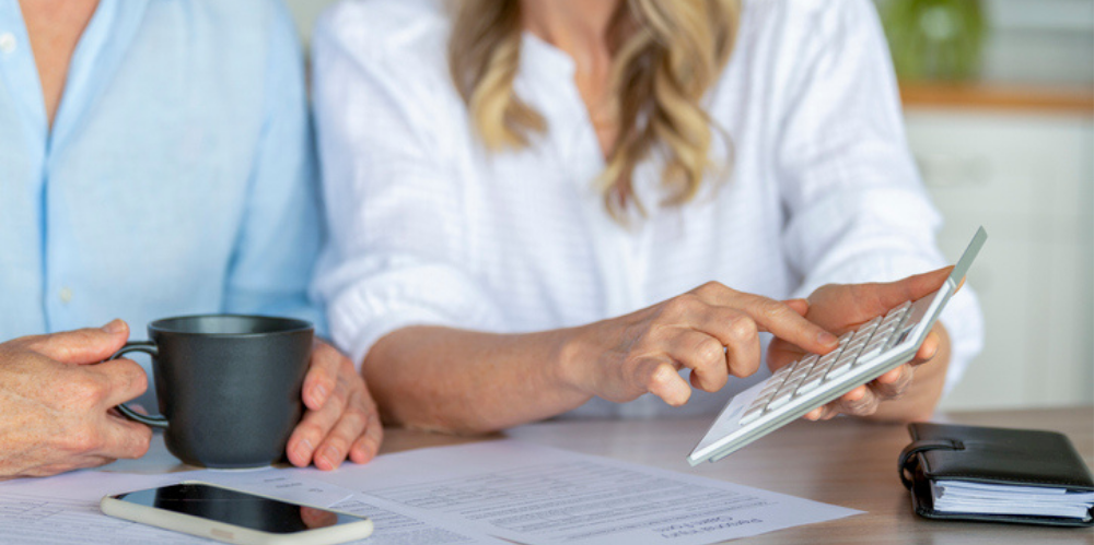 Mature Couple working on their home finances.