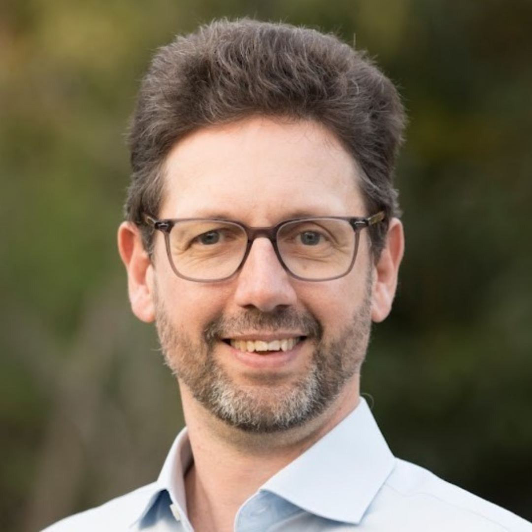 A headshot of Peter Yeates