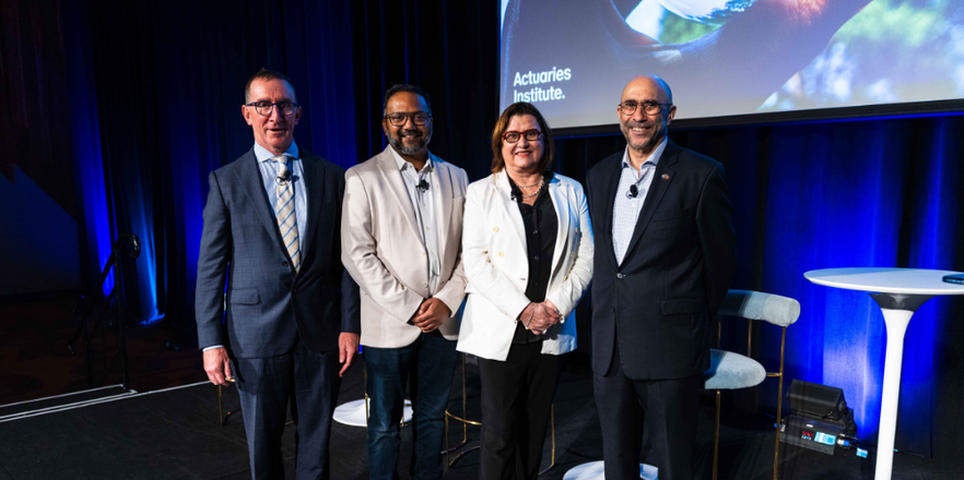 Andrew Matthews, Suhit Anantula, Jacki Johnson and Ian Hamm on stage at the 2026 All Actuaries Summit opening plenary