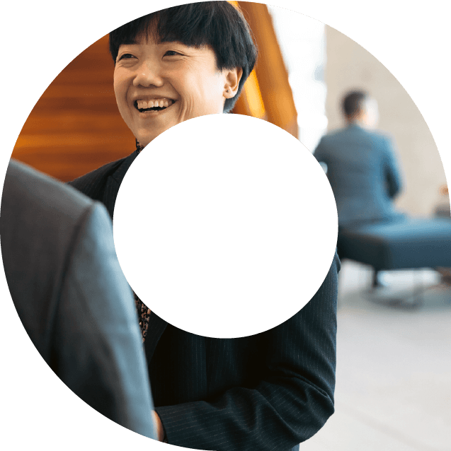 actuary laughing with a colleague