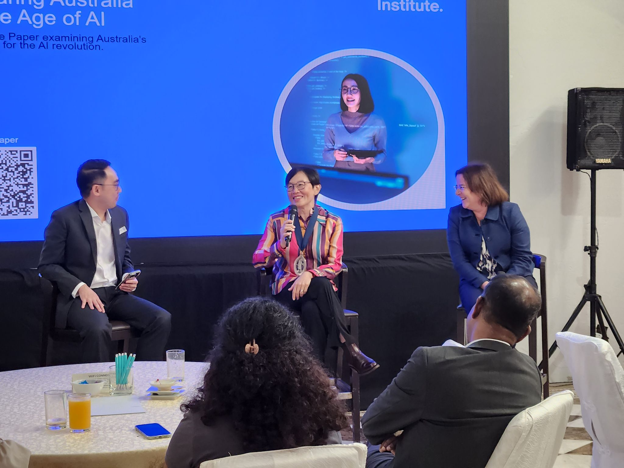 Win-Li presenting during the 2025 Presidential Asia Tour