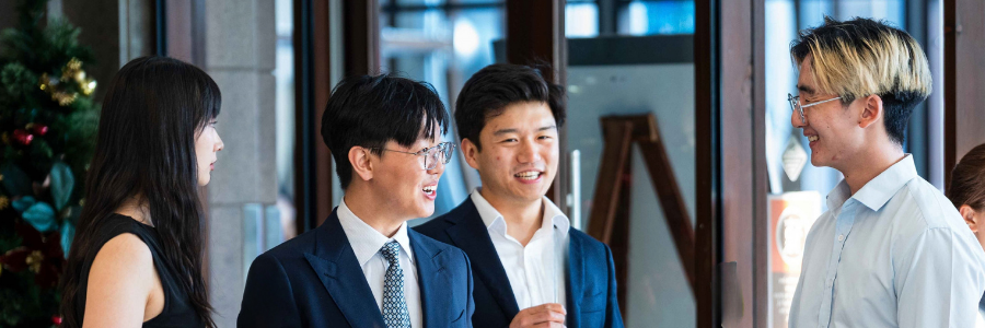 Image of Sydney graduates socialising