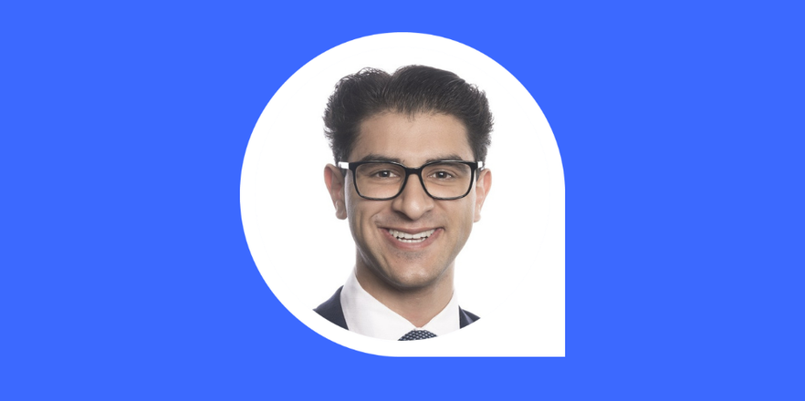 A headshot of Aniket Panesar within a viewfinder, against an Actuaries Institute blue background