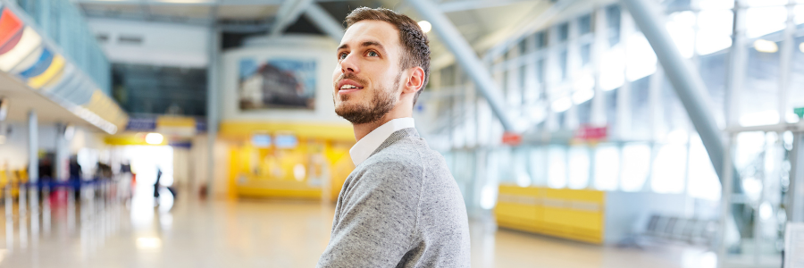Man walking through airport 