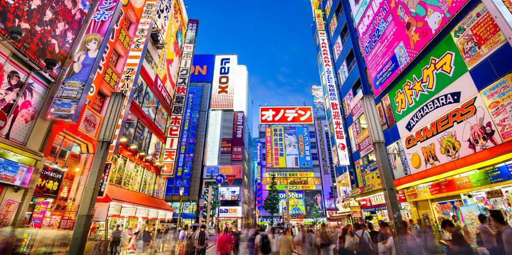 A vibrant dusk-setting photo of Tokyo's streets.