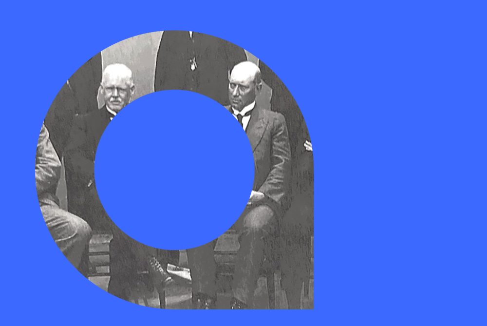 Blue background with viewfinder overlaid and black and white image of business men seated