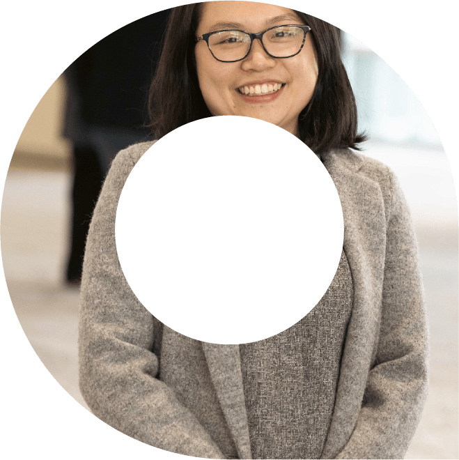 Actuary in grey suit smiling