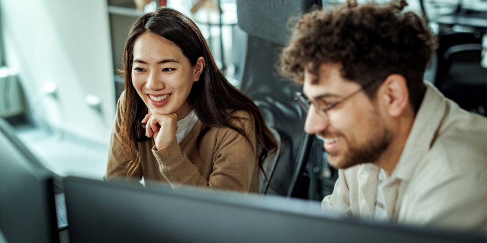 Colleagues working together at the office.