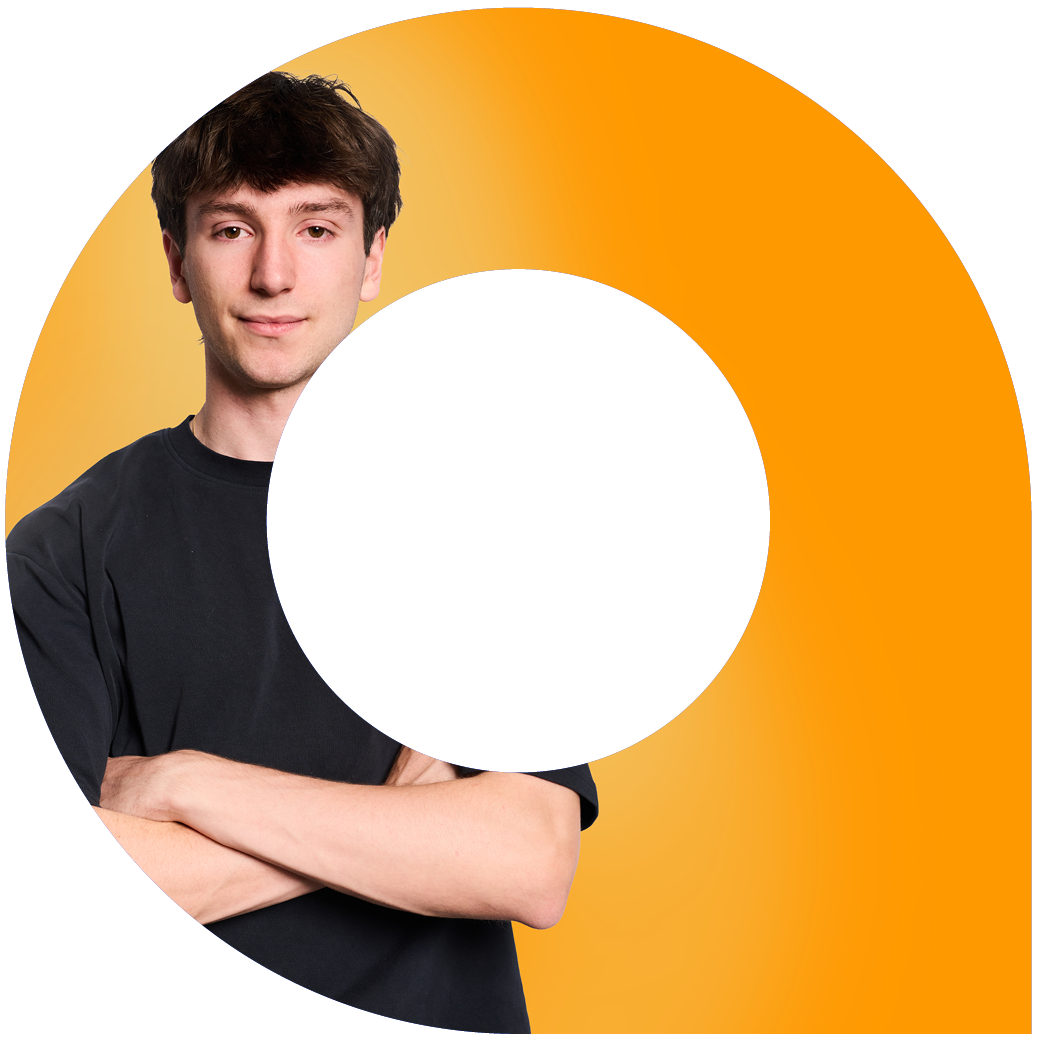 Male with arms folded looking at camera in black tshirt with orange background