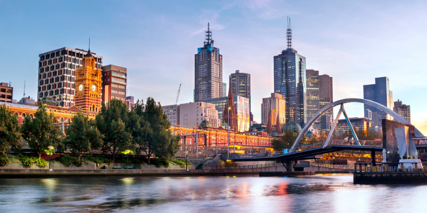 Melbourne, Australia, in early morning light. Yarra River, towards Flinders Street Station.