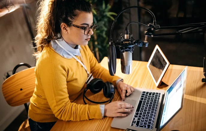 Radio commentator working on show