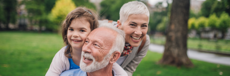 Grandparents with young girl. 