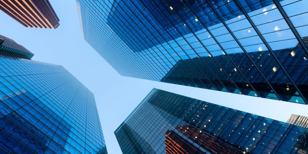 Photo of tall buildings taken from the bottom looking up