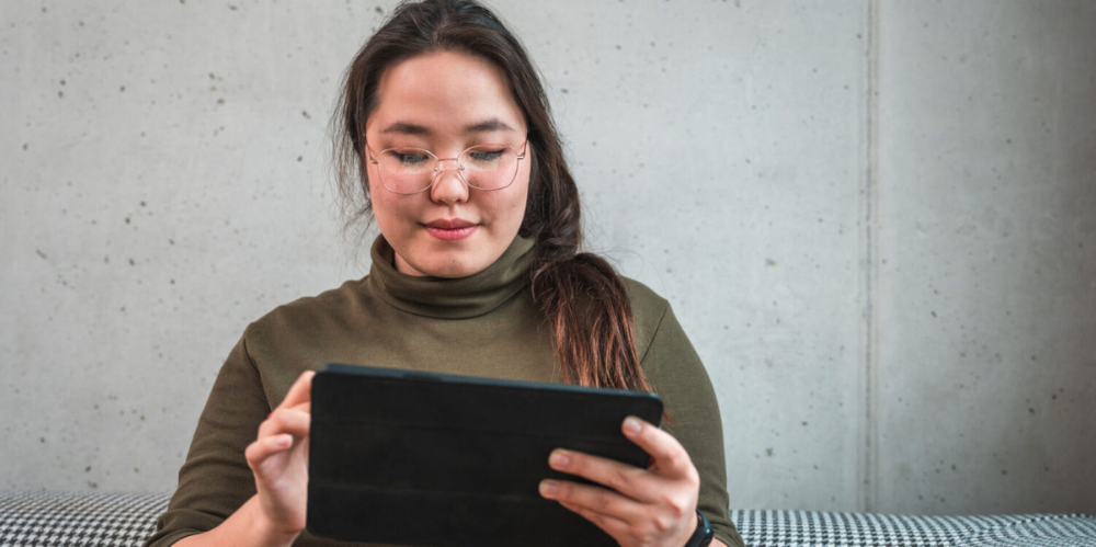 Lady holding an Ipad