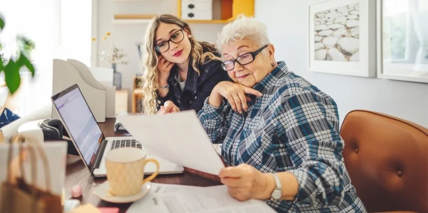 Mature business women with staff