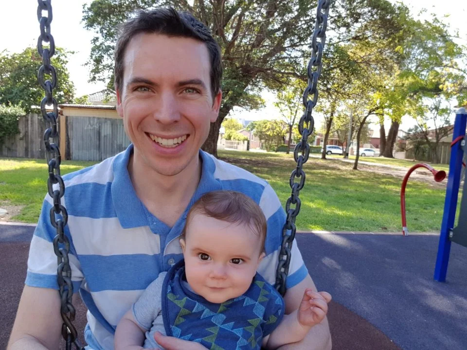 Garreth holding his son Jamie.