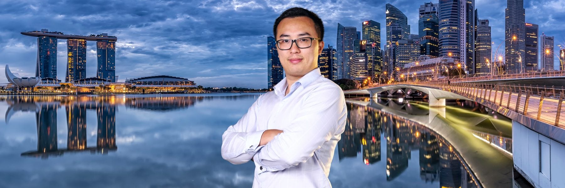 A photo of Samuel Chu against a city backdrop.