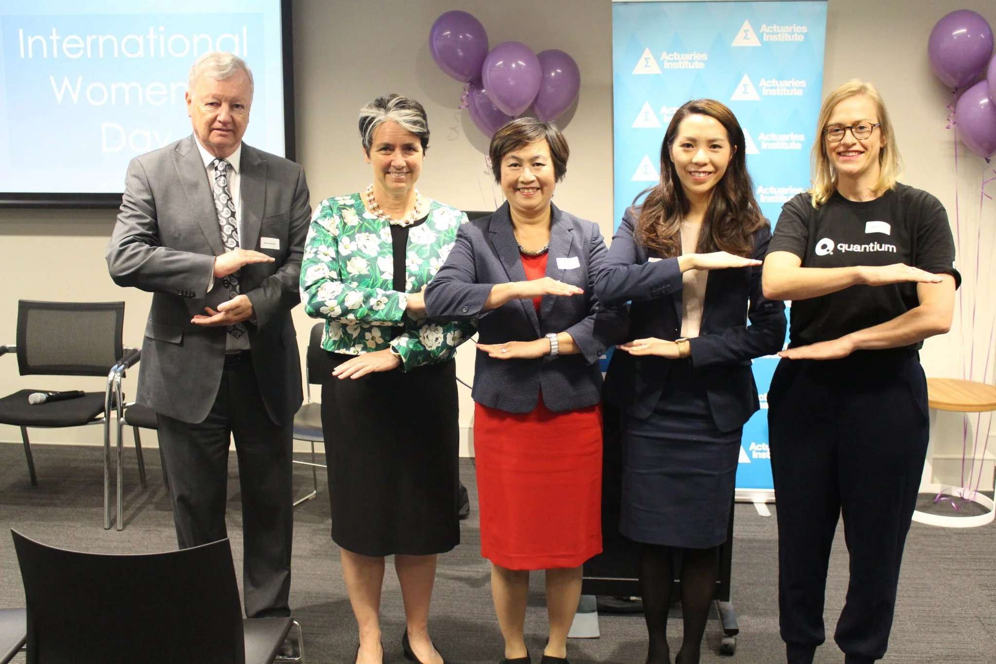 Michael Rice, Jennifer Lang, President Hoa Bui and speakers Michelle Ng and Lisa Petty at the 2020 International Women's Day event prepared by the DIWG